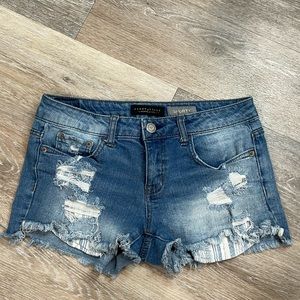 Aeropostale distressed denim shorts with striped peek a boo front pockets